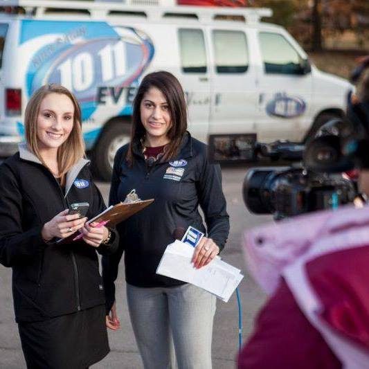 Natalie reporting in the field with the 10/11 News crew.
