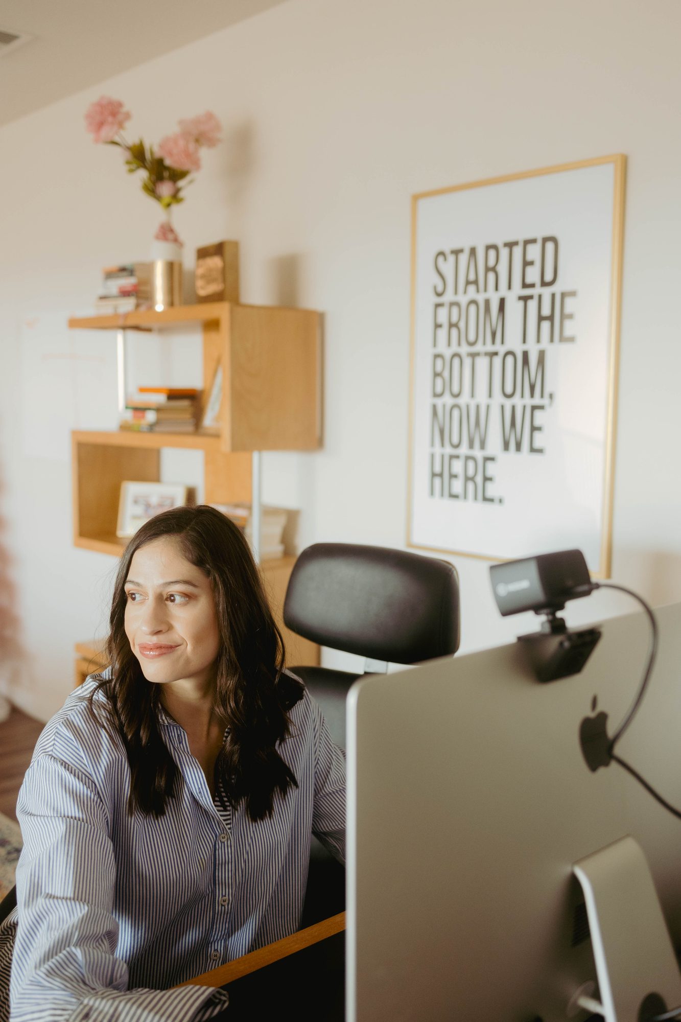 Natalie working at her desk.